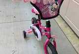 Minnie Mouse bike with matching helmet