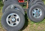 2 sets 6 lug Chevy/ Gmc wheels