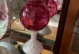 Fenton cranberry vases with milk glass