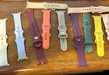 lot of apple watch bands and screen prot