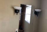 light fixtures and mirror