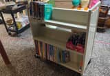 Two sided mobile shelf / book rack