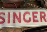 singer sewing machine sign