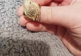 Real ring size 7(I' m pretty sure) gold