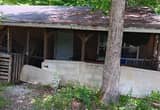 unfinished house and 8.82 acres for sale