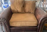 Leather chair with cloth cushions