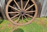 Two antique wagon wheels