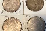 four 1921 morgan dollars