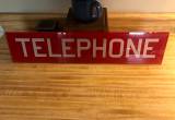 telephone booth sign